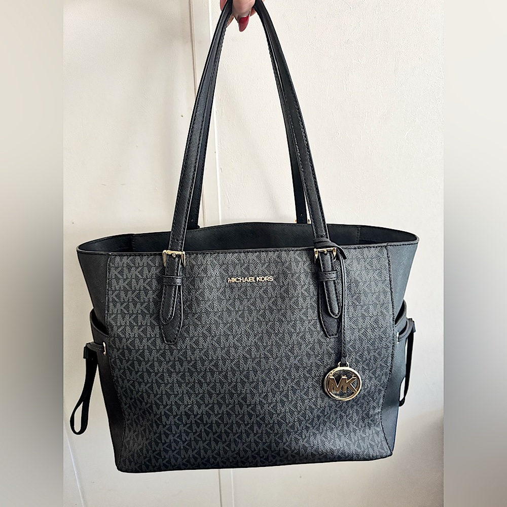 Authentic Michael Kors Monogram Voyager Bag